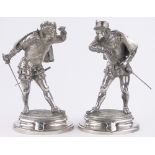 A pair of 19th century electroplate duelling cavalier figures,