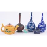 A group of Oriental items, including a pair of blue and white narrow necked vases, height 18cm,