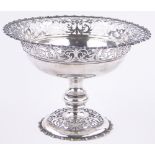 An Edwardian circular silver fruit tazza, with pierced fretwork surround,