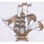 A detailed Portuguese silver filigree gilt and enamel model of a Galleon with 3 masts,