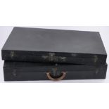 A pair of Vintage Louis Vuitton black leather travelling cases, original labels serial no.