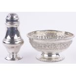 A small circular silver pepperette, and a continental silver bowl with chased frieze, diameter 10cm,