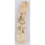 A Chinese ivory carving circa 1900, in the form of a man carrying a basket and rabbit, height 20cm.