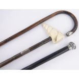 A Victorian carved ivory seashell design walking stick, handle length 10cm,