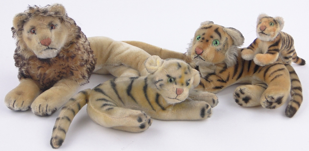 A Steiff soft toy lion and 3 tigers, length 26cm, (4).