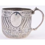 A large Victorian silver Christening mug, embossed and chased designs, makers Charles Edwards,