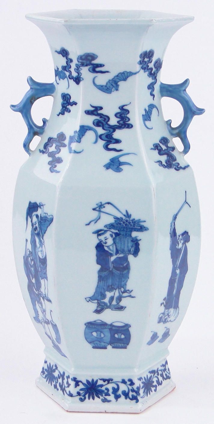 A Chinese blue and white porcelain vase of hexagonal form, with painted designs of figures and bats,