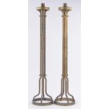 Pair of Arts & Crafts floor standing candle stands, 95cm.