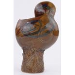 A treacle glazed Studio Pottery vase by G Owen Jones, height 39cm.