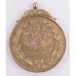 Football/cricket interest, a 15ct gold medal presented to William (Billy) Gunn 1858-1921,