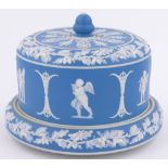 A Wedgwood blue and white Jasper cheese dish and cover, with relief classical designs,