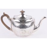 A George III oval silver teapot, with engraved Greek key frieze by Thomas Wallis, London 1805, 12.