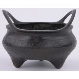 A Chinese bronze censer, engraved surround, impressed seal mark under, diameter 15cm.