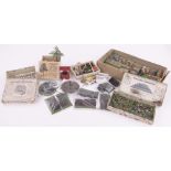 A collection of Britain's die-cast miniature garden items, including a boxed Span roof greenhouse,