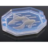 A French Art Deco Vaseline glass ashtray with fish designs, length 13cm.