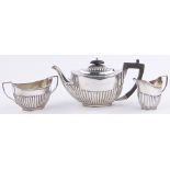 A 3-piece silver teaset, of half fluted oval form, London 1899,