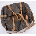 A large Louis Vuitton monogrammed holdall, length 70cm.