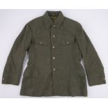 A Second World War Japanese winter tunic, no insignia, Japanese markings inside.