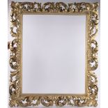 A large 19th century relief-carved Florentine giltwood frame,