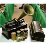 An early Edison cylinder record player with brass horn, and various cylinders.
