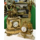 A continental marble and gilt brass 2-train mantel clock surmounted by a figure,