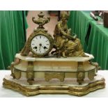 A continental marble and spelter clock on stand.