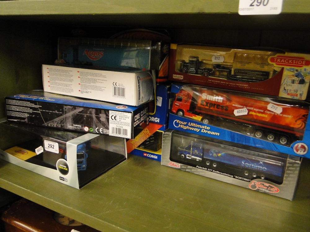 3 Corgi boxed Artic lorries and 6 others.