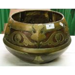 An Eastern turned hardwood table centre bowl with engraved brass decoration.