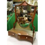 An Edwardian inlaid mahogany swing toilet mirror with 2 drawers under.