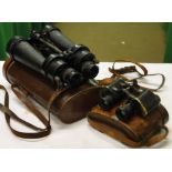 A pair of Barr & Stroud military binoculars in leather case and a small pair of early leather cased