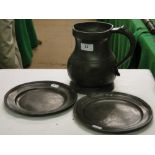 2 Pewter plates and a half gallon pewter jug.