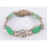 A Chinese 14ct gold jade set bracelet, gross weight 12g.