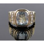 An 18ct gold aquamarine and diamond panel ring, setting height 14mm, size S, gross weight 11.2g.