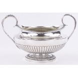 A George IV silver 2-handled bowl, of half fluted circular form,