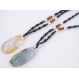 2 Modern Chinese carved jade pendants, on beadwork chains, (2).