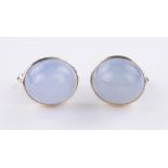 Pair of 9ct gold dome shaped white agate set cufflinks, 8.62g, length 18mm.
