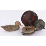 A collection of fishing and shooting items, including a carved wood decoy duck, length 24cm,