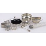 A group of silver items, including circular box and cover, circular sugar bowl,