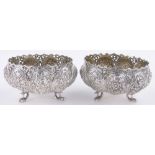 Pair of ornate late Victorian circular silver bowls,