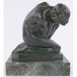 Eugene Bourgouin (1880-1924), a dark green patinated bronze study of a crouching woman,