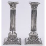 Pair of 19th century Dutch silver Corinthian column candlesticks, continental hallmarks,