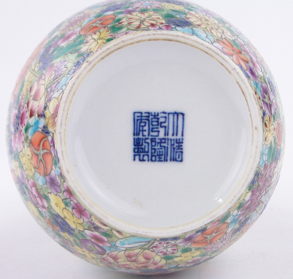 A Chinese porcelain narrow necked vase, with painted enamel floral decoration, - Image 3 of 3