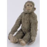 A Steiff soft toy monkey circa 1920, height 60cm.