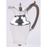 A Victorian silver milk jug with lid, indistinct makers marks, London 1892, 10.25 oz.