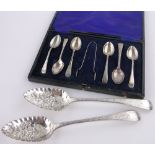 A pair of George III silver berry spoons, London 1811 and a cased set of silver teaspoons and tongs.