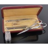 A French silver 4-piece sewing set, circa 1900, in original Morocco leather case, length 12cm.
