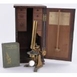 A Victorian brass student's microscope, by Baker of High Holborn, London, height 36cm,