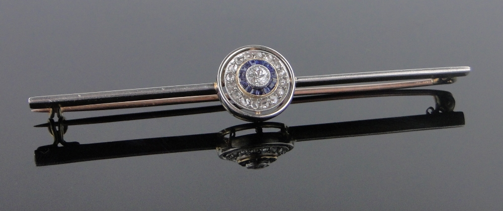 An Art Deco sapphire and diamond cluster bar brooch, unmarked gold settings, length 75mm.