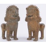 A pair of Oriental gilt bronze ceremonial lions, height 30cm.