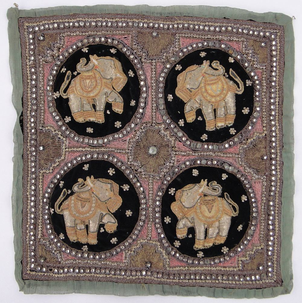 An early 20th century Indian beadwork wall hanging, 60cm x 60cm.